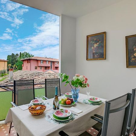Casa Milly - Happy Rentals เดเซนซาโนเดลการ์ดา ภายนอก รูปภาพ