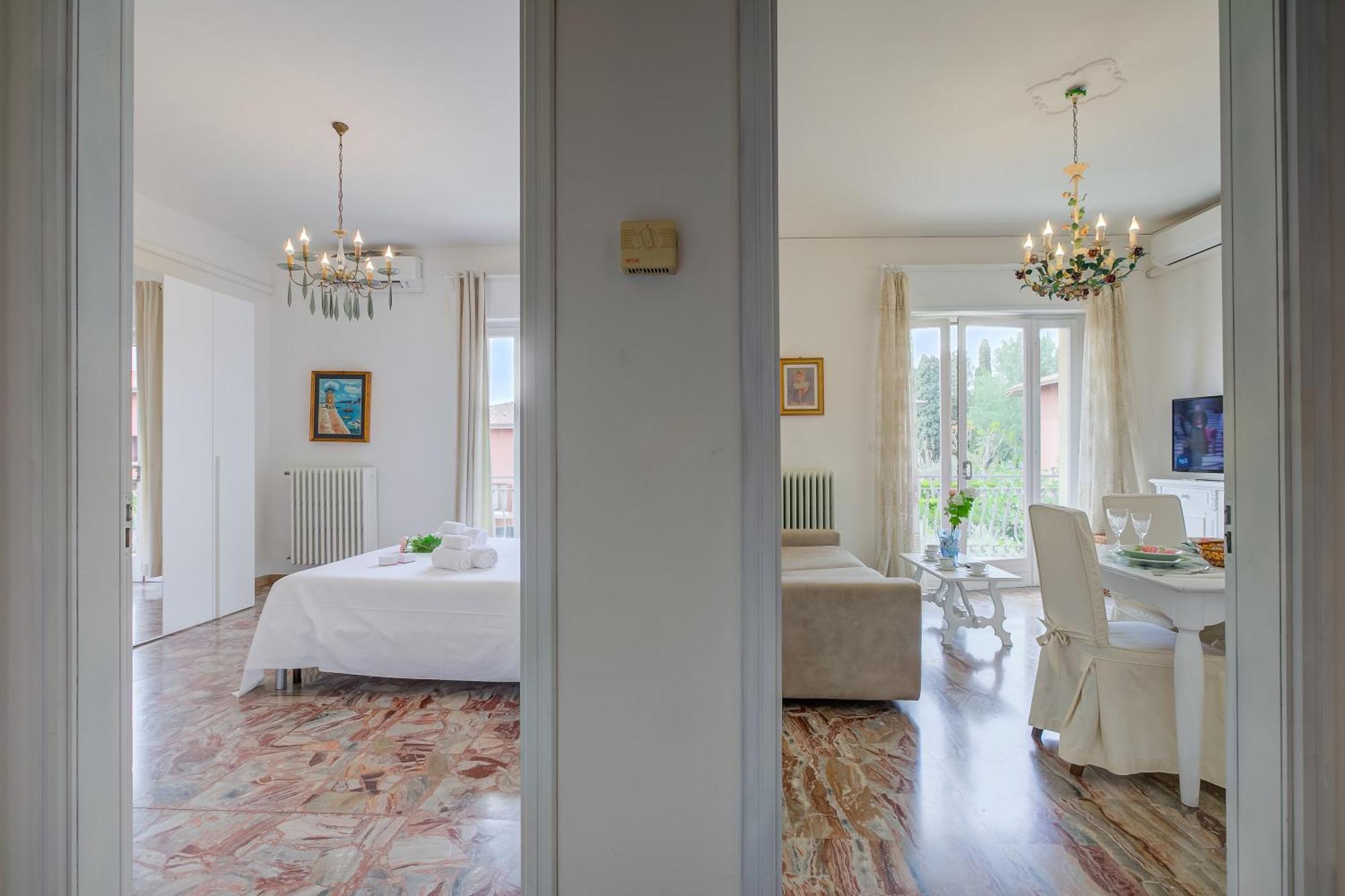 Casa Milly - Happy Rentals เดเซนซาโนเดลการ์ดา ภายนอก รูปภาพ